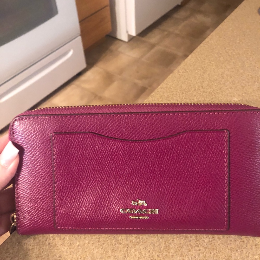 Beautiful berry colored Coach wallet